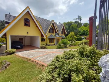 Casa com 4 dormitórios, 380 m² - Condomínio Jardim Véu da Noiva - Campos do Jordão/SP