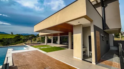 Casa com 3 suítes, 611 m² - Condomínio Village da Serra - Tremembé/SP