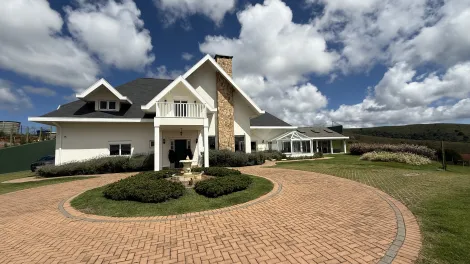 imagem 1 - Casa à venda com 4 suítes no Condomínio Jardim Monte Belo em Campos do Jordão/SP. imagem 1 - Casa à venda com 4 suítes no Condomínio Jardim Monte Belo em Campos do Jordão/SP.