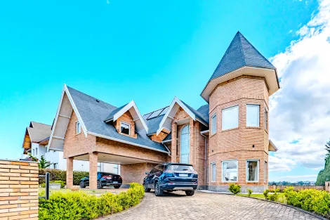 imagem 1 - Casa à venda com 4 suítes no Condomínio Villa Dei Fiori em Campos do Jordão/SP. imagem 1 - Casa à venda com 4 suítes no Condomínio Villa Dei Fiori em Campos do Jordão/SP.